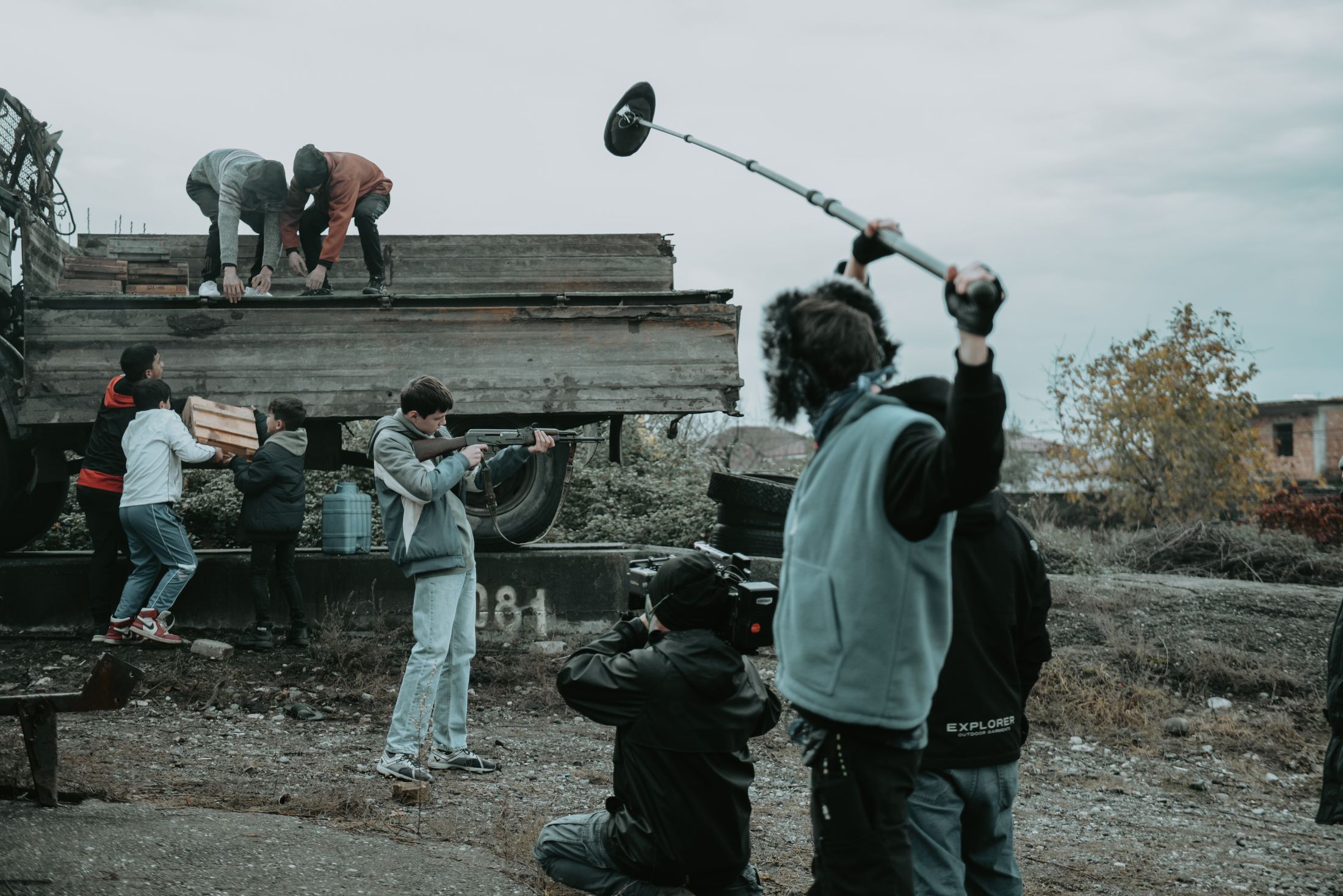 Film crew recording an outdoor scene